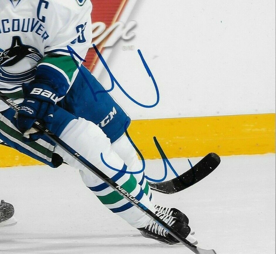 Autographed Vancouver Canucks Henrik Sedin 8x10 Photo Original