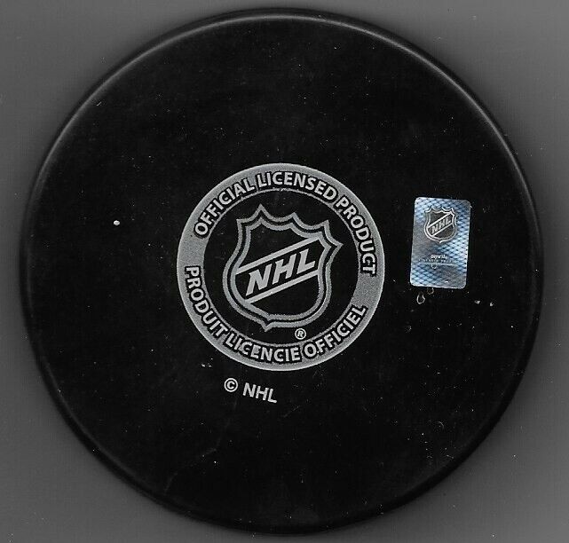 Pistolet Pete Puck original autographié par Pierre Jarry des Rangers de New York