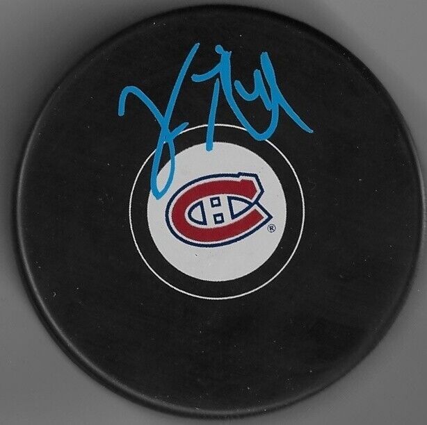 Autographed Montreal Canadiens Vincent Lecavalier Hockey Puck Original