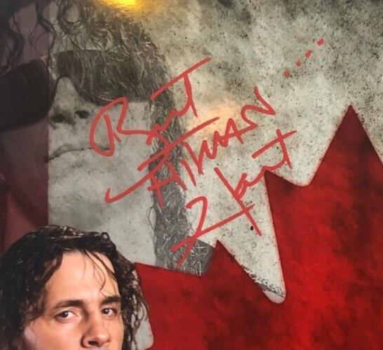 Autographed Trish Stratus and Bret Hart signed 11x14 custom edit JSA