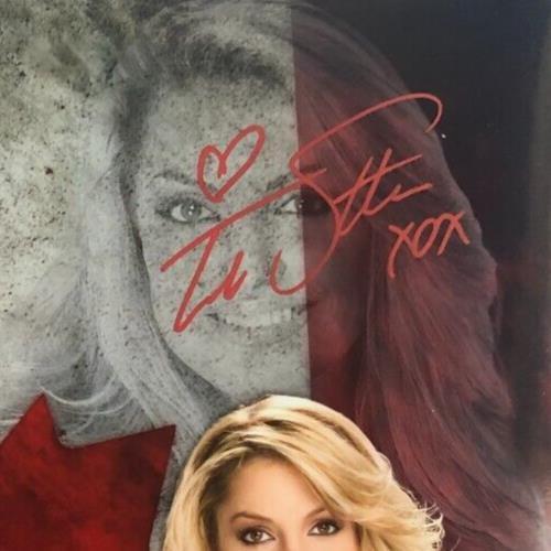 Autographed Trish Stratus and Bret Hart signed 11x14 custom edit JSA