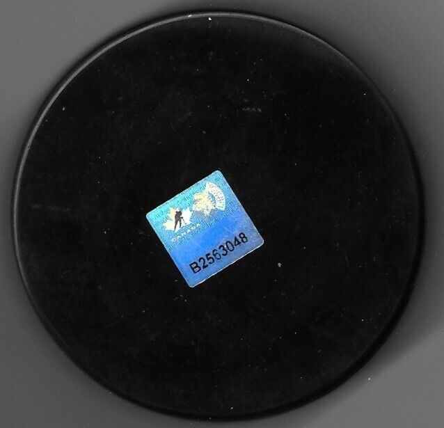 Autographed Team Canada Melodie Daoust Hockey Puck Original Inscribed 2 x Gold