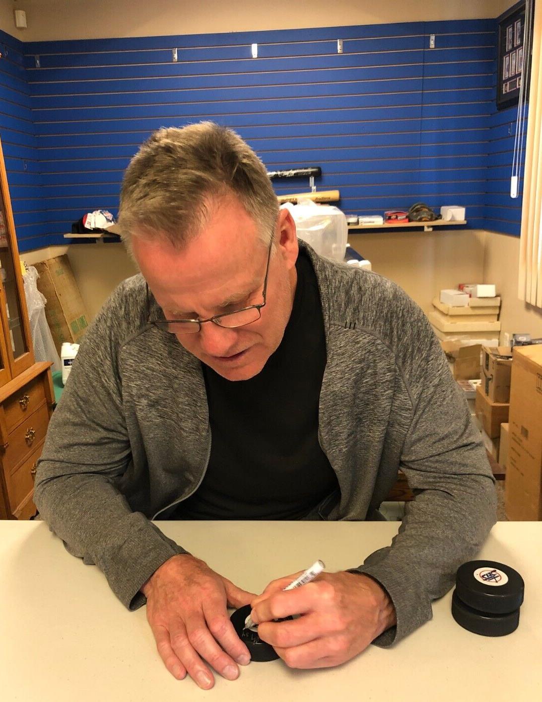 Rondelle de hockey autographiée par Gord Donnelly des Nordiques de Québec