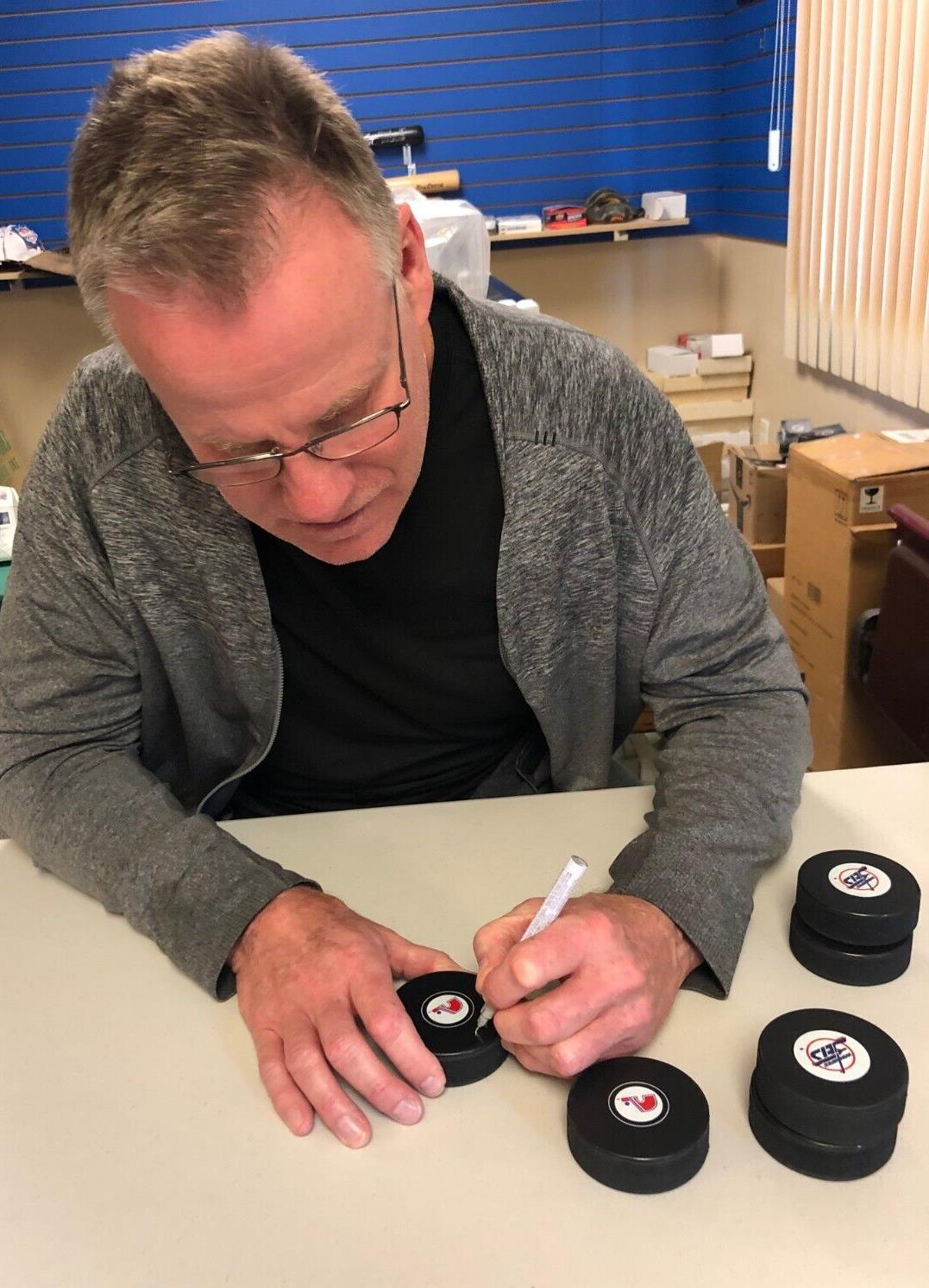 Rondelle de hockey autographiée par Gord Donnelly des Nordiques de Québec