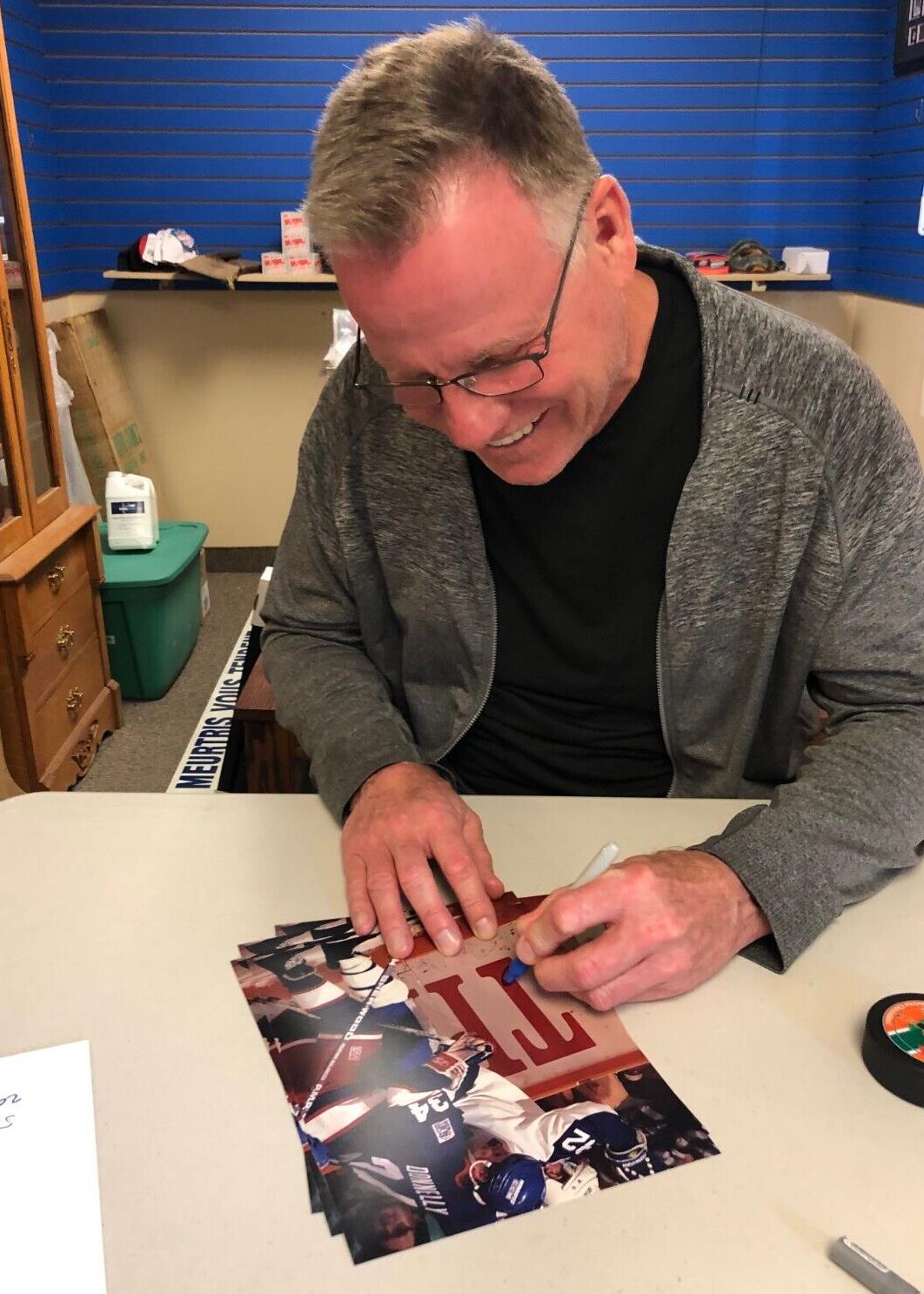 Rondelle de hockey autographiée par Gord Donnelly des Nordiques de Québec