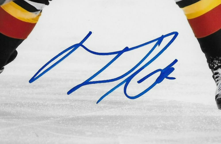 Signed MacKenzie Weegar Calgary Flames Autographed 8x10 Photo #1 Original