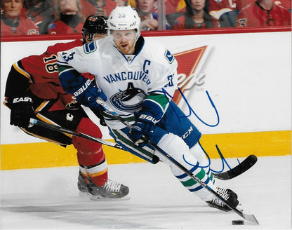 Autographed Vancouver Canucks Henrik Sedin 8x10 Photo Original