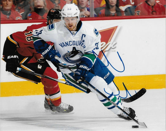 Autographed Vancouver Canucks Henrik Sedin 8x10 Photo Original