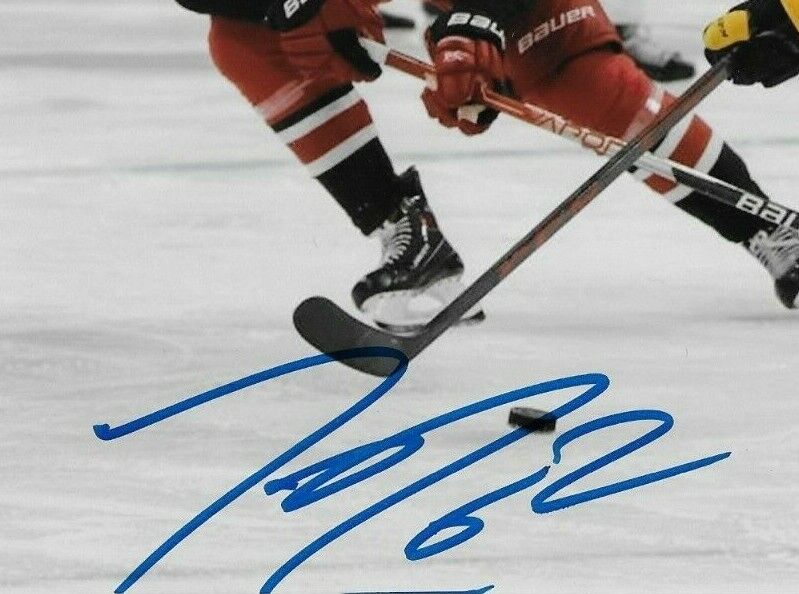 Autographed Carolina Hurricanes Jesperi Kotkaniemi 8x10 Photo Original