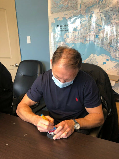 Rondelle autographiée par Oleg Petrov des Canadiens de Montréal, champion de la Coupe Stanley 1992-1993