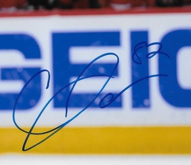 Autographed Chicago Blackhawks Caleb Jones 8x10 Photo Original