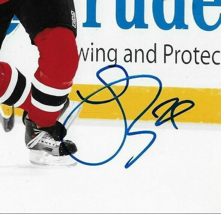 Photo autographiée 8x10 signée Johnny Oduya par les Devils du New Jersey #1