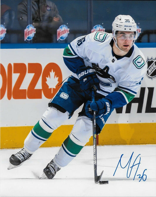 Autographed Vancouver Canucks Nils Hoglander  8x10 Photo Original