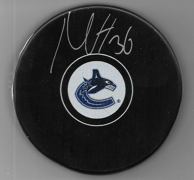Autographed Vancouver Canucks Nils Hoglander  8x10 Photo Original