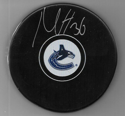 Autographed Vancouver Canucks Nils Hoglander  8x10 Photo Original