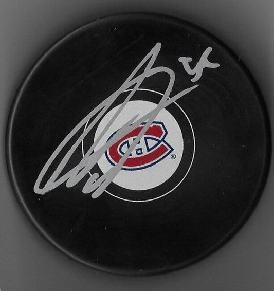 Autographed Montreal Canadiens Mattias Norlinder Hockey Puck Original